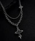 Dominus — thorned silver cross pendant on layered chain